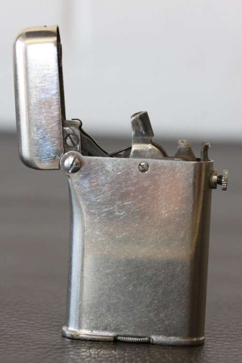 A magnificent antique (1920) original "Thorens" automatic cigarette lighter made in Switzerland