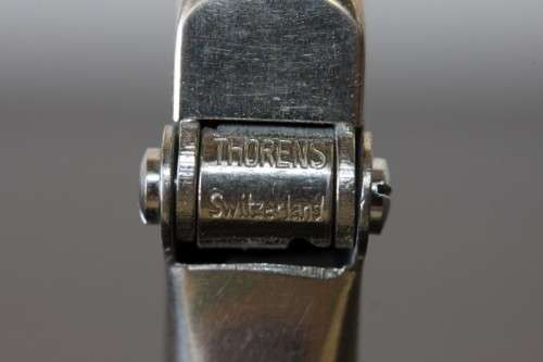 A magnificent antique (1920) original "Thorens" automatic cigarette lighter made in Switzerland