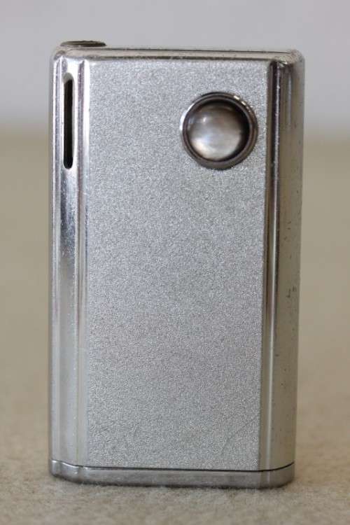A superb original "Win Battery Electric" cigarette lighter with pouch in its original case