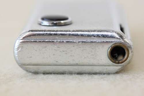 A superb original "Win Battery Electric" cigarette lighter with pouch in its original case