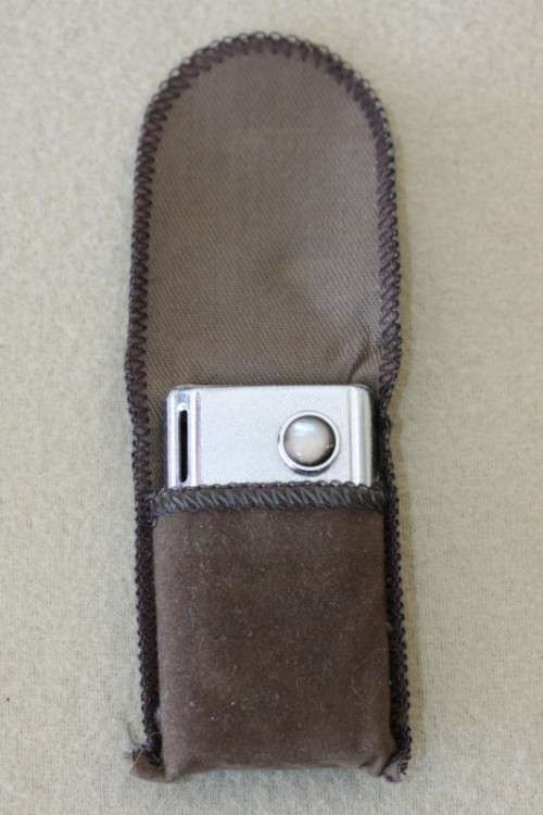 A superb original "Win Battery Electric" cigarette lighter with pouch in its original case