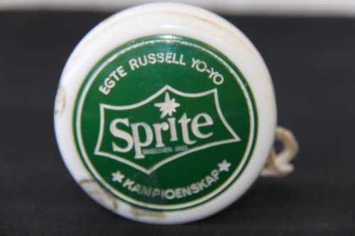 An incredible vintage Genuine Russell "championship" Sprite yo-yo with string - very collectable!