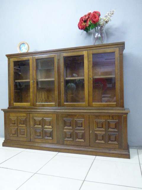 An exquisite vintage Teak 'Adam Bede' bookcase/showcase with a double door bottom cabinet.Stunning!!