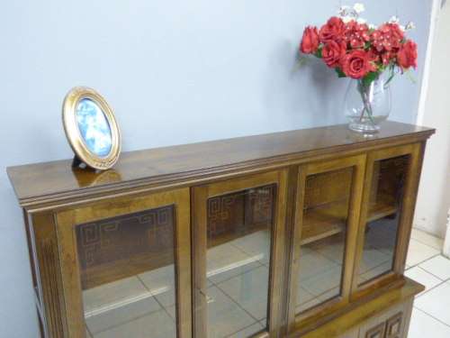 An exquisite vintage Teak 'Adam Bede' bookcase/showcase with a double door bottom cabinet.Stunning!!