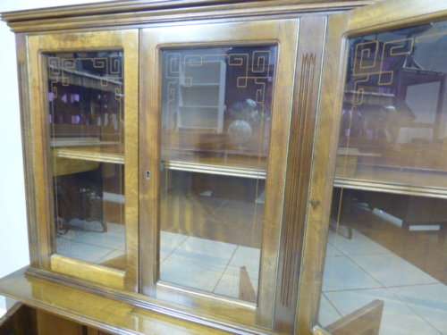 An exquisite vintage Teak 'Adam Bede' bookcase/showcase with a double door bottom cabinet.Stunning!!
