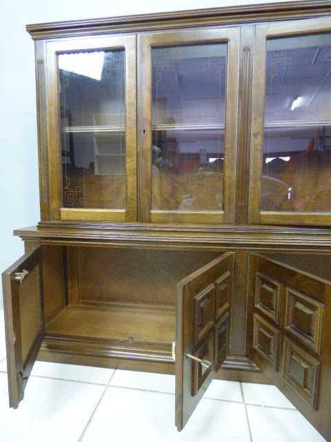 An exquisite vintage Teak 'Adam Bede' bookcase/showcase with a double door bottom cabinet.Stunning!!