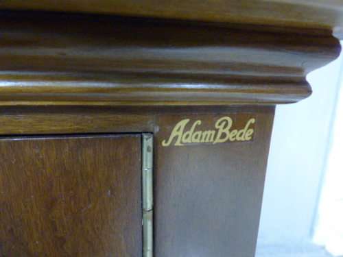 An exquisite vintage Teak 'Adam Bede' bookcase/showcase with a double door bottom cabinet.Stunning!!