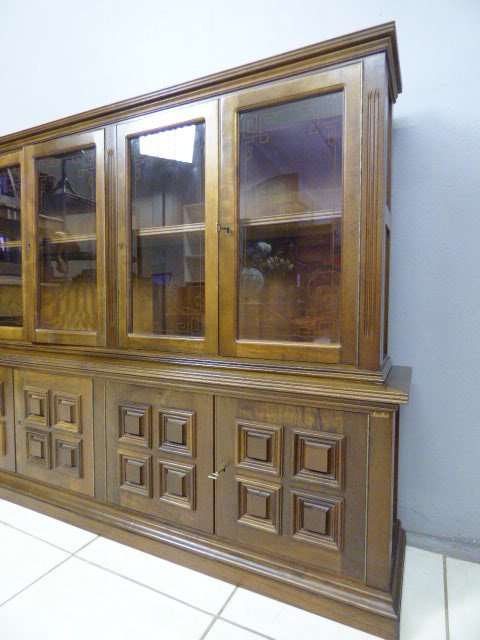 An exquisite vintage Teak 'Adam Bede' bookcase/showcase with a double door bottom cabinet.Stunning!!