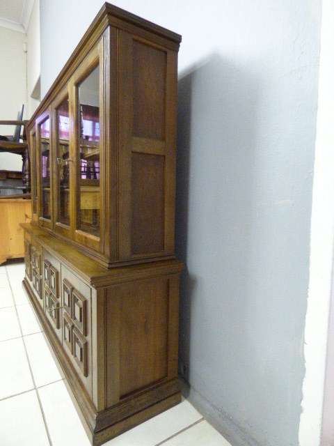An exquisite vintage Teak 'Adam Bede' bookcase/showcase with a double door bottom cabinet.Stunning!!