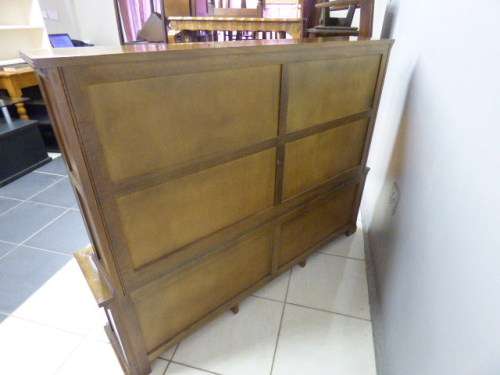 An exquisite vintage Teak 'Adam Bede' bookcase/showcase with a double door bottom cabinet.Stunning!!