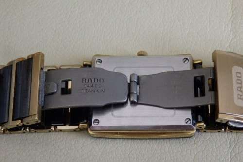 A superb gents Swiss made Rado "DiaStar" black ceramic & gold quartz watch with date display