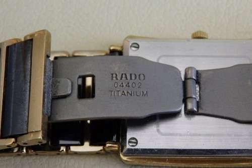 A superb gents Swiss made Rado "DiaStar" black ceramic & gold quartz watch with date display