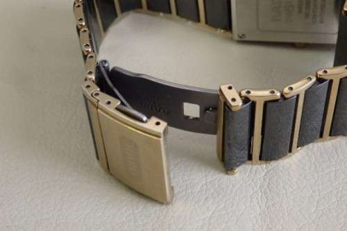 A superb gents Swiss made Rado "DiaStar" black ceramic & gold quartz watch with date display