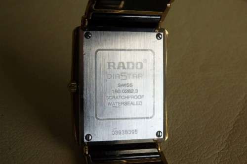 A superb gents Swiss made Rado "DiaStar" black ceramic & gold quartz watch with date display