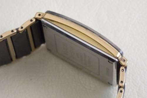 A superb gents Swiss made Rado "DiaStar" black ceramic & gold quartz watch with date display