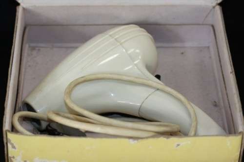 An exquisite vintage (1955) General Electric hair dryer w/ box & stand in perfect working condition