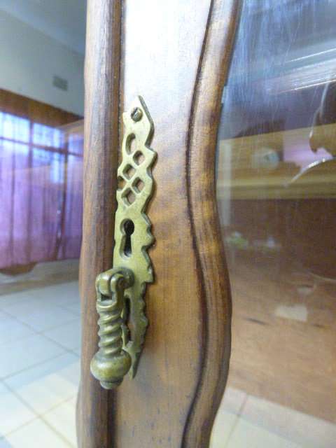 An exquisite vintage solid Imbuia glass door ball and claw showcase w shelves. Absolutely beautiful