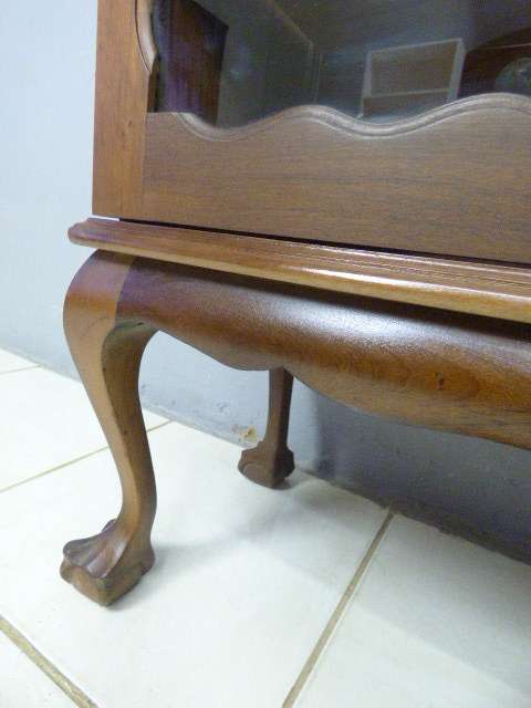 An exquisite vintage solid Imbuia glass door ball and claw showcase w shelves. Absolutely beautiful