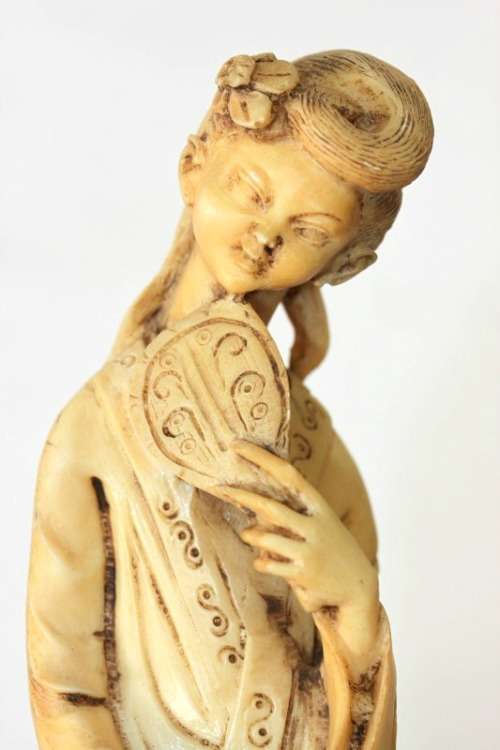 A lovely oxylite figurine of a Chinese lady in remarkable condition
