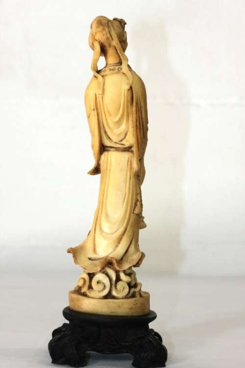 A lovely oxylite figurine of a Chinese lady in remarkable condition