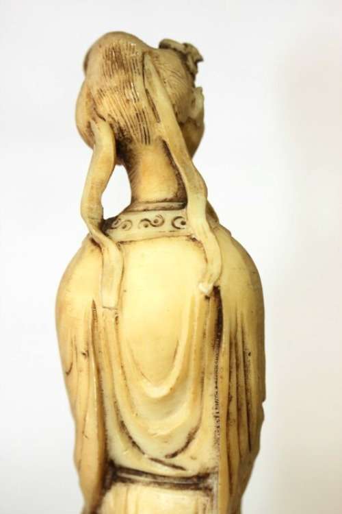 A lovely oxylite figurine of a Chinese lady in remarkable condition