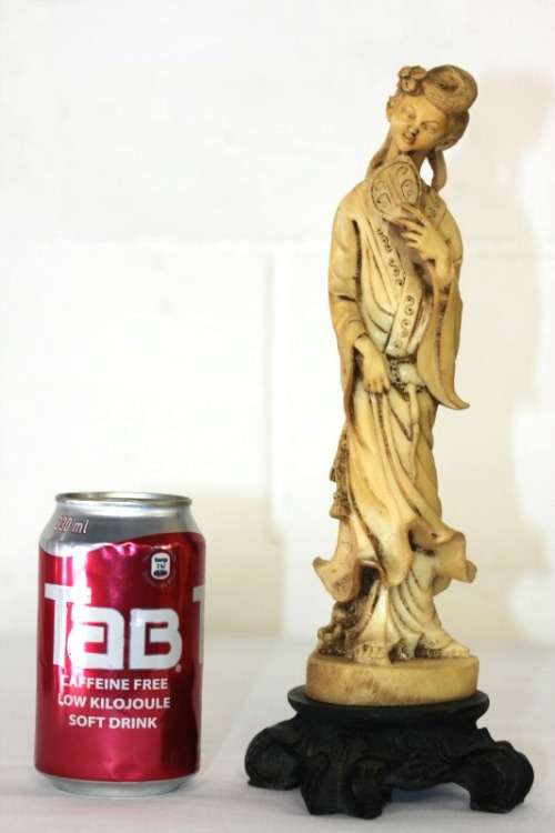 A lovely oxylite figurine of a Chinese lady in remarkable condition
