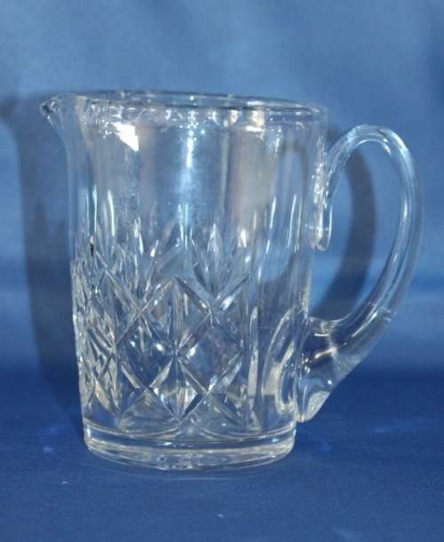 A spectacular lead crystal whiskey water jug w/ beautiful cut crystal detailing in superb condition