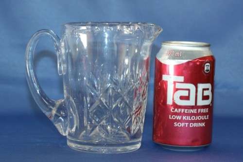 A spectacular lead crystal whiskey water jug w/ beautiful cut crystal detailing in superb condition