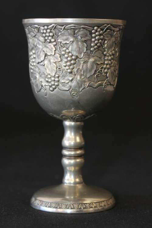 A stunning pair of silver plated (on copper) wine goblets w/ stunning detailing on them