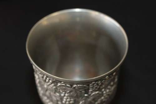 A stunning pair of silver plated (on copper) wine goblets w/ stunning detailing on them