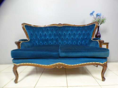 magnificent hand carved Victorian sofa's with deep button detailing and padded armrest.