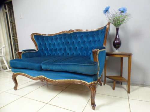 magnificent hand carved Victorian sofa's with deep button detailing and padded armrest.