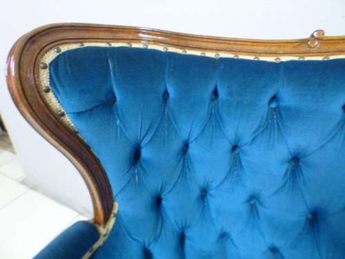 magnificent hand carved Victorian sofa's with deep button detailing and padded armrest.