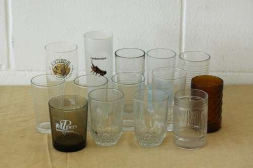 An awesome collection of assorted drinking glasses including branded glasses - bid/glass