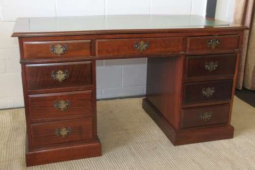 A spectacular imbuia ladies executive desk with 9x drawers in stunning condition
