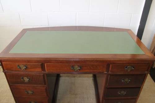 A spectacular imbuia ladies executive desk with 9x drawers in stunning condition