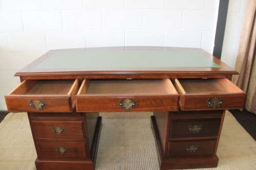 A spectacular imbuia ladies executive desk with 9x drawers in stunning condition