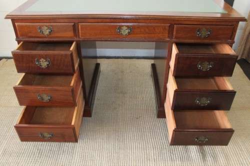 A spectacular imbuia ladies executive desk with 9x drawers in stunning condition