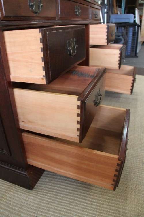 A spectacular imbuia ladies executive desk with 9x drawers in stunning condition
