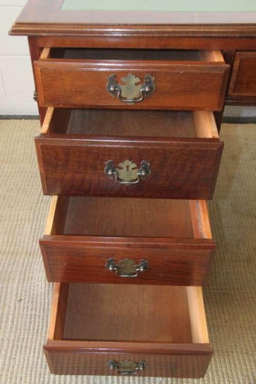 A spectacular imbuia ladies executive desk with 9x drawers in stunning condition
