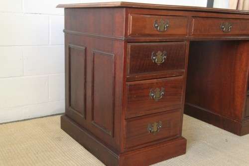 A spectacular imbuia ladies executive desk with 9x drawers in stunning condition