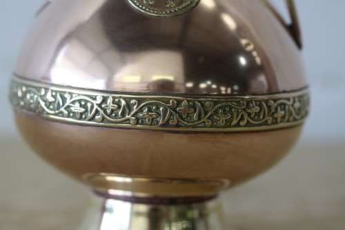 A beautiful vintage solid copper pitcher/ jug with solid brass embellishments and detailing