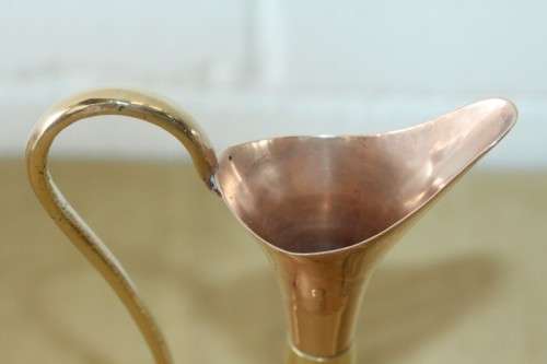 A beautiful vintage solid copper pitcher/ jug with solid brass embellishments and detailing