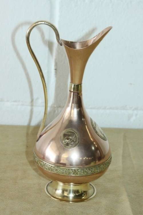A beautiful vintage solid copper pitcher/ jug with solid brass embellishments and detailing