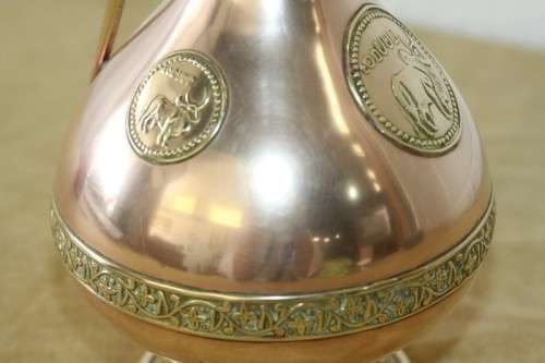 A beautiful vintage solid copper pitcher/ jug with solid brass embellishments and detailing
