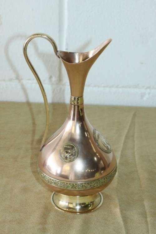 A beautiful vintage solid copper pitcher/ jug with solid brass embellishments and detailing