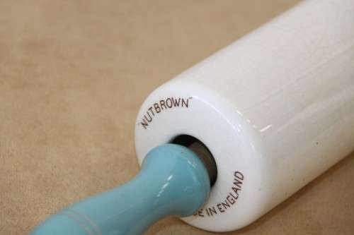 A stunning vintage ceramic "Nutbrown" rolling pin made in England in amazing condition