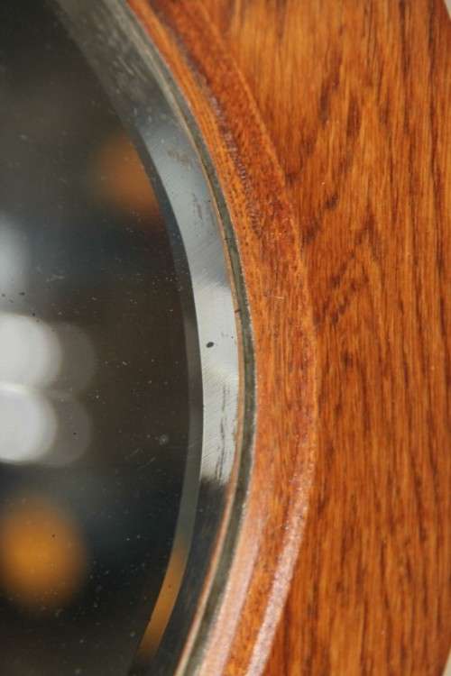 A magnificent antique solid oak dressing table w/ 6 drawers & a large beveled mirror on castors