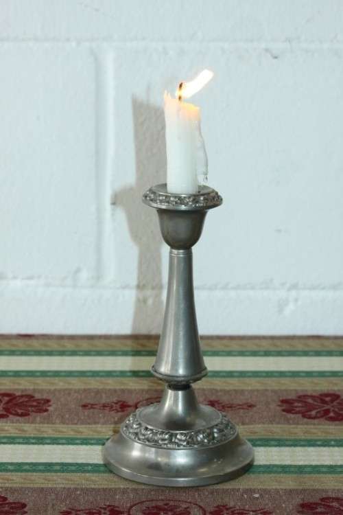 A beautiful vintage English made silver plated candle holder with stunning ornate detaining RS17
