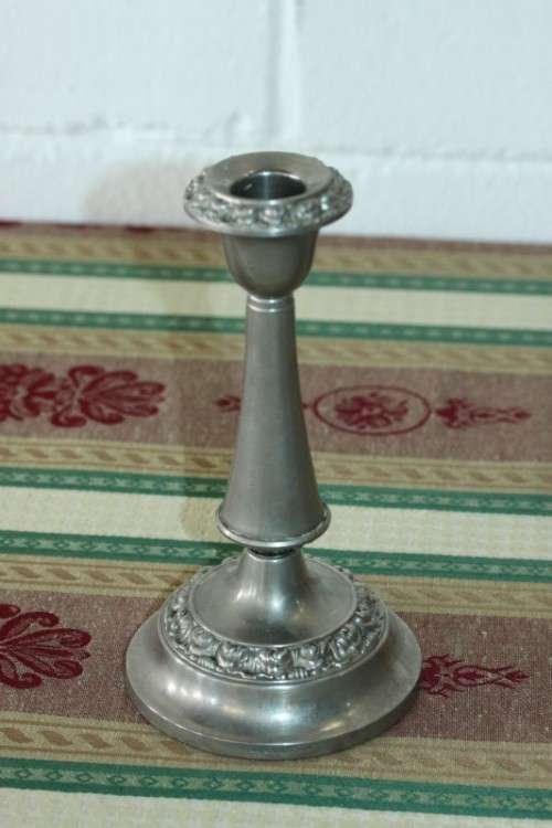 A beautiful vintage English made silver plated candle holder with stunning ornate detaining RS17